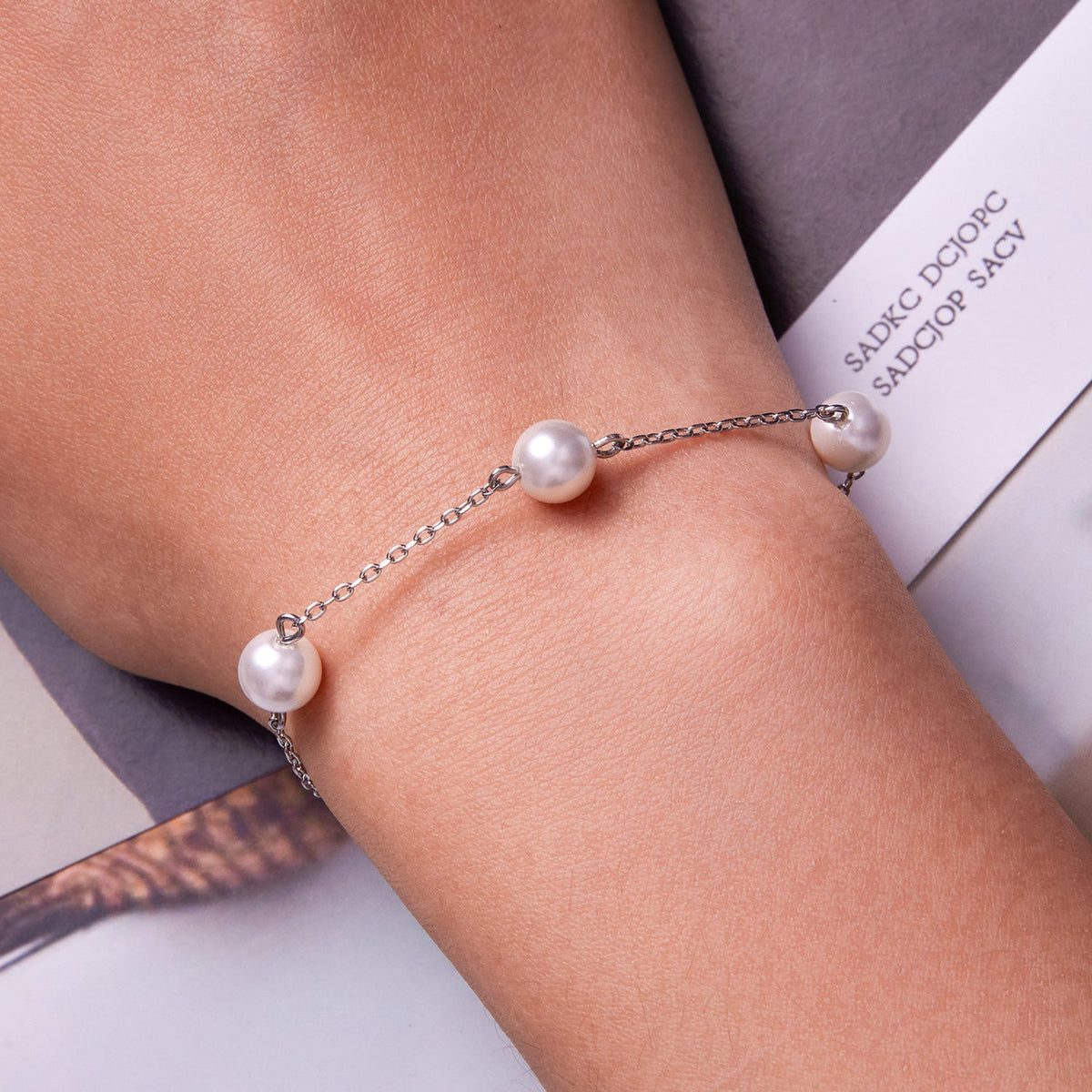 Sterling Silver Platinum-Plated Shell Pearl Adjustable Bracelet