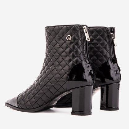 The Celeste Black Tip Quilted Leather Women’s Boot
