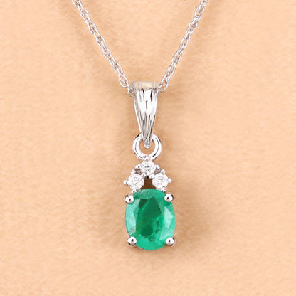 0.64 Carat Genuine Zambian Emerald and White Diamond 10K White Gold Pendant