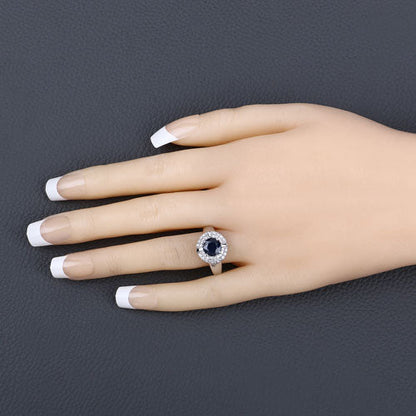 10K White Gold Blue Sapphire and Diamond Halo Ring