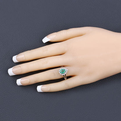 White Gold Zambian Emerald and Diamond Halo Ring
