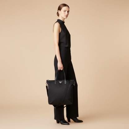 Prada Re-Nylon Black Tote Bag — held by model in studio