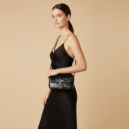 Marc Jacobs The Mini J Marc Black Sequined Leather Shoulder Bag — held by model in studio