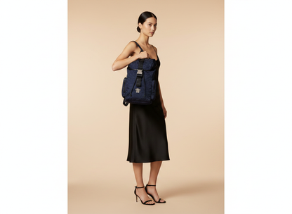 Versace Medusa Nylon Drawstring Backpack — held by model in studio