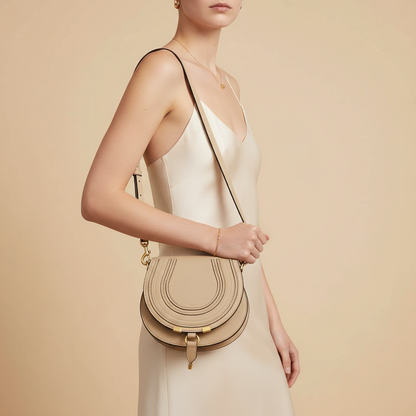 Chloé Marcie Beige Calfskin Shoulder Bag — held by model in studio