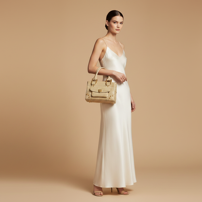 Chopard Caroline Mini Matte Beige Alligator Leather Handbag 95000-0280 — held by model in studio