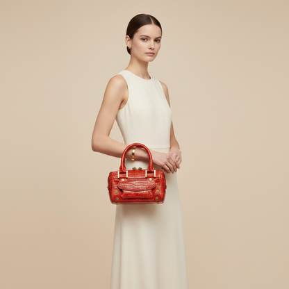 Chopard Baby Caroline Red Shiny Alligator Leather Handbag 95000-0282 — held by model in studio