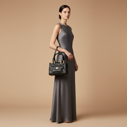 Chopard Caroline Mini Matte Black Alligator Leather Handbag 95000-0176 — held by model in studio
