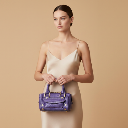 Chopard Baby Caroline Purple Shiny Alligator Leather Handbag 95000-0283 — held by model in studio