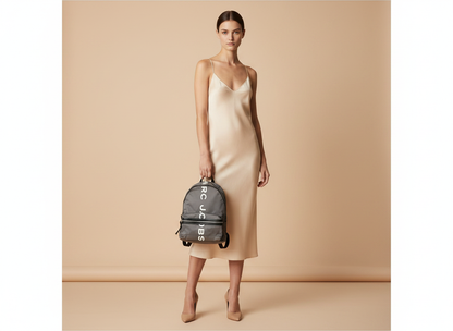 Marc Jacobs Suspiria Nylon Backpack Bookbag — held by model in studio